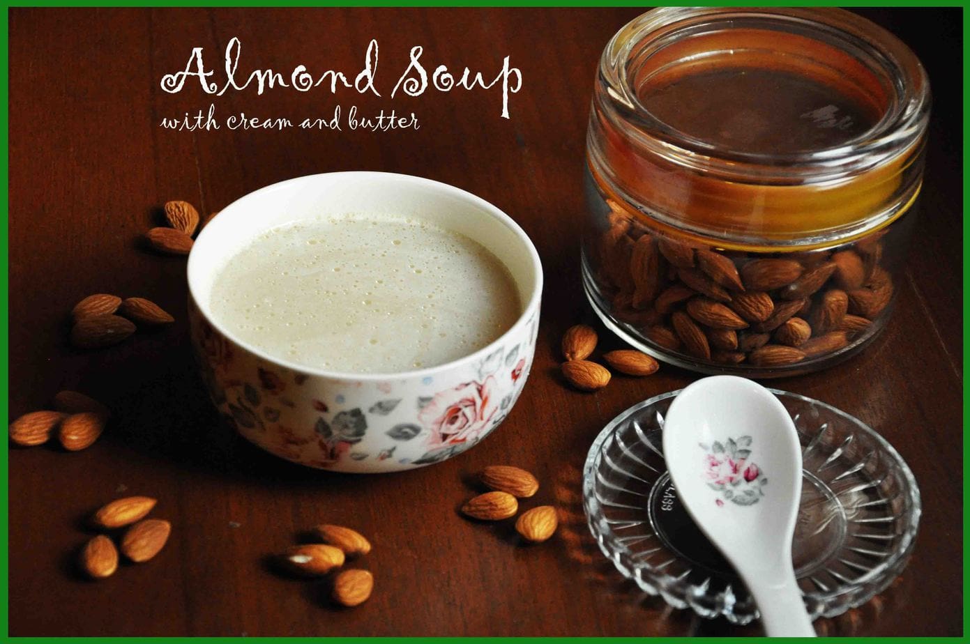almond soup in bowl with jar of almond in the background