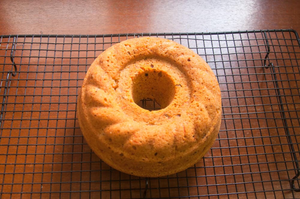 Cool carrot bundt cake on a wire rack.