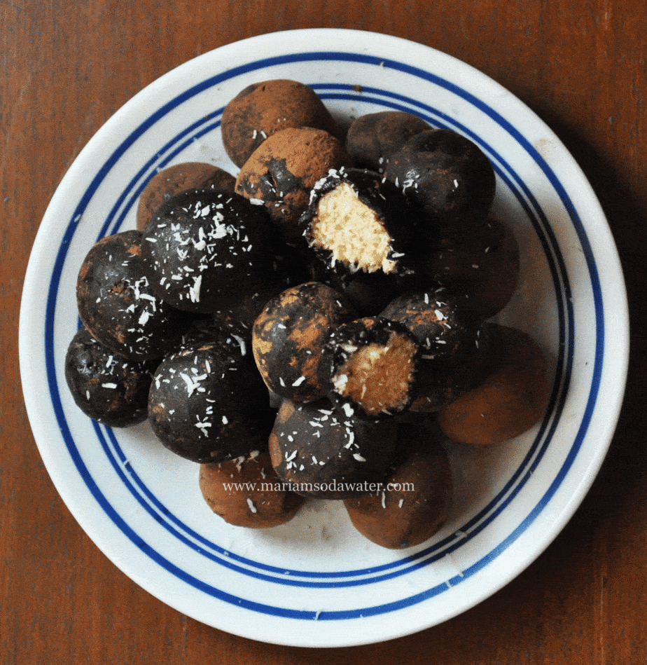 Cover photo of coconut balls dipped in chocolate. 