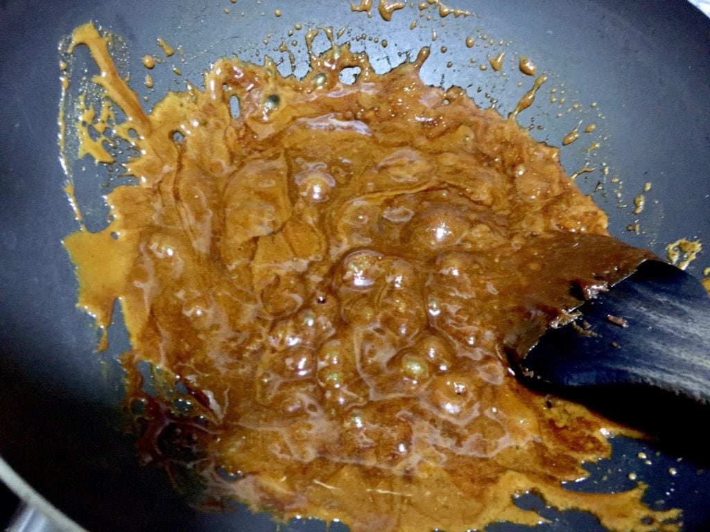 Jaggery begins to caremelize.