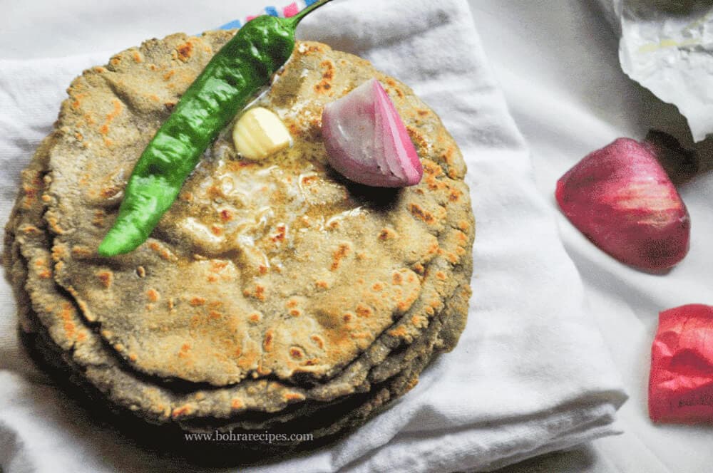 bajra roti with a dallop butter.