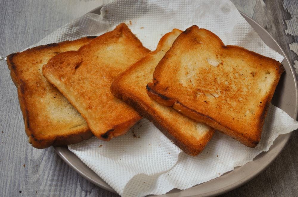 Fried crunchy bread slices.