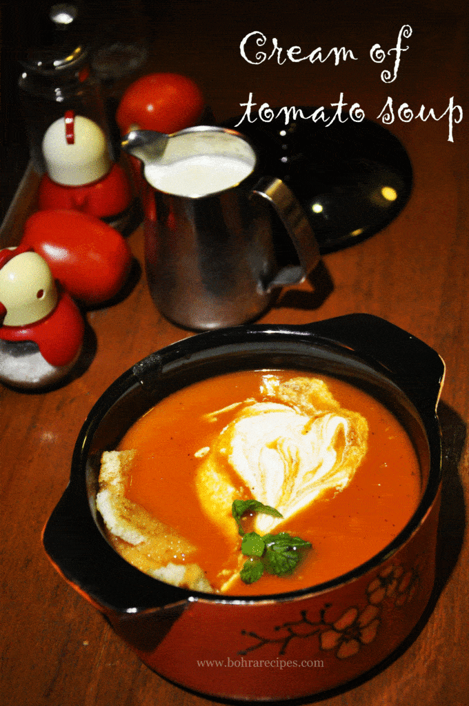 tomato soup in bowl with cream
