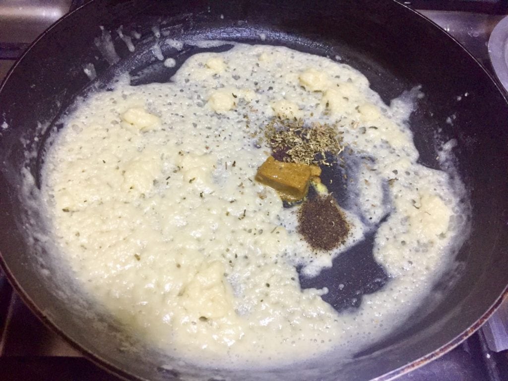 Add seasoning in white sauce.