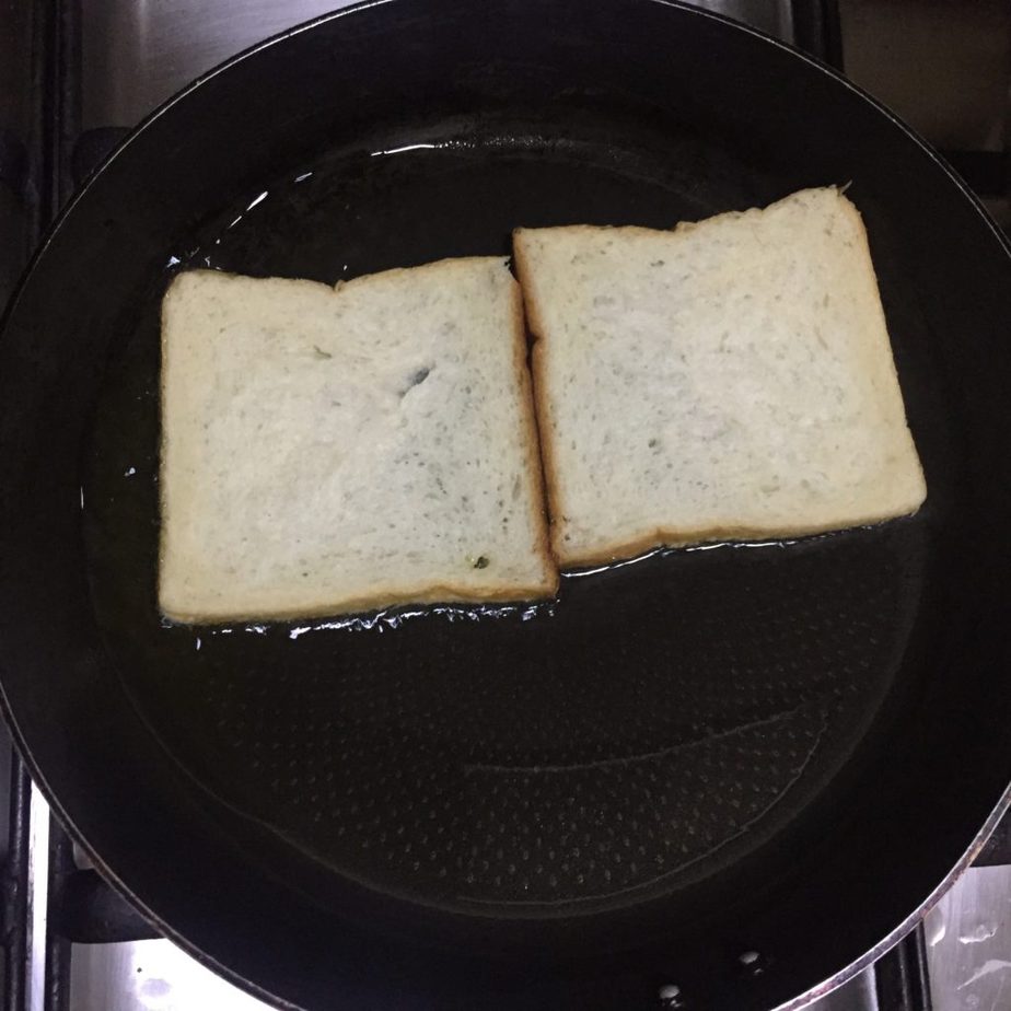 Fry bread slices in oil.