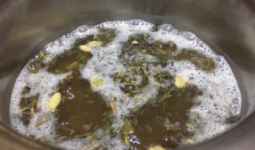 Boil kashmiri tea.