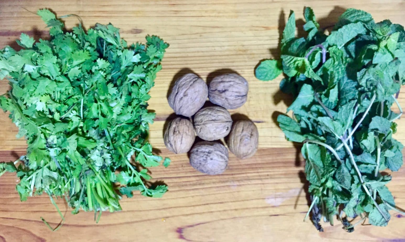 Cilantro, mint and walnut for haryali paste.