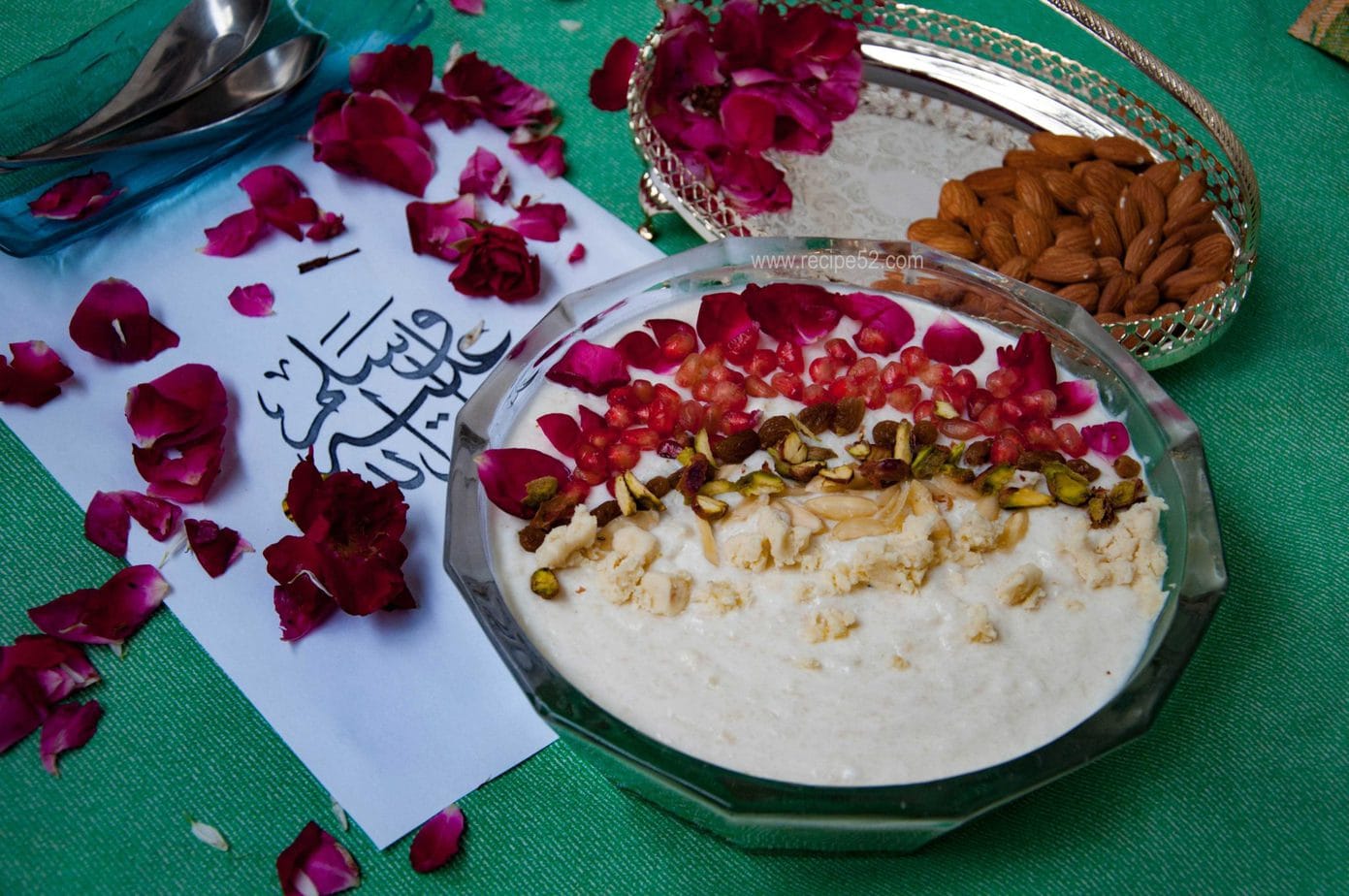 bohra kalamra garnished with nuts and rose petals