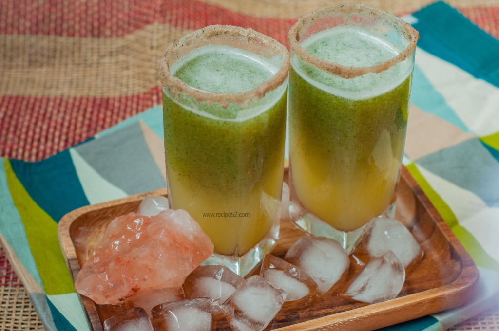 Aam Panna Sharbat recipe with ice cubes on the side.