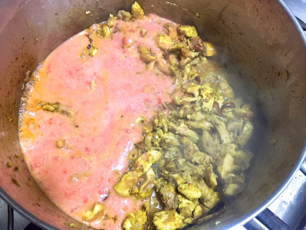 Add tomato to the khao soi curry.