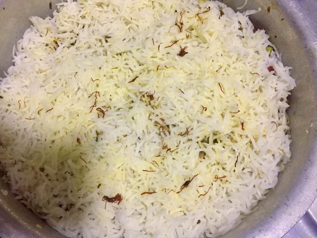 assembling vegetable biryani