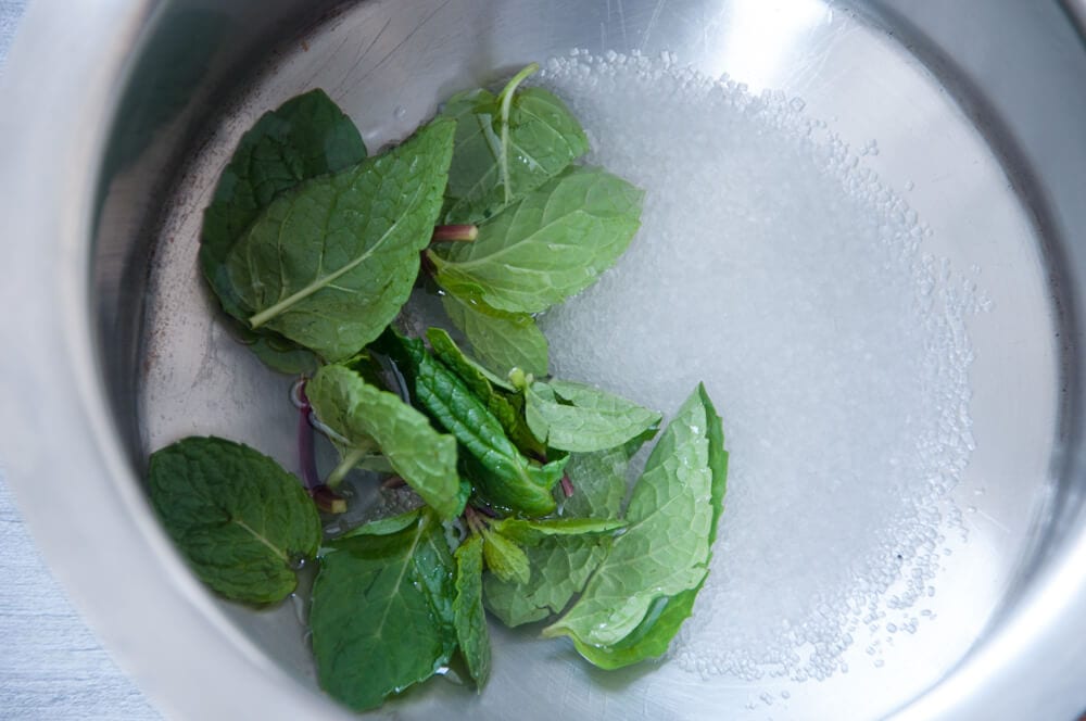 mint, water, sugar in a pot to make sugar syrup.