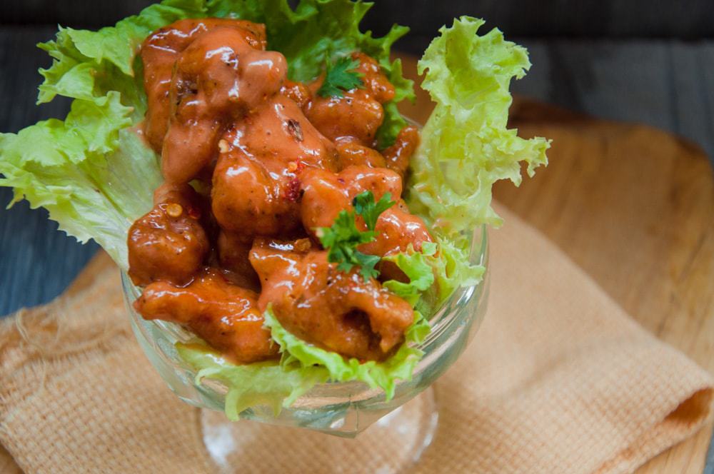 Crispy spicy fried chicken, close up.