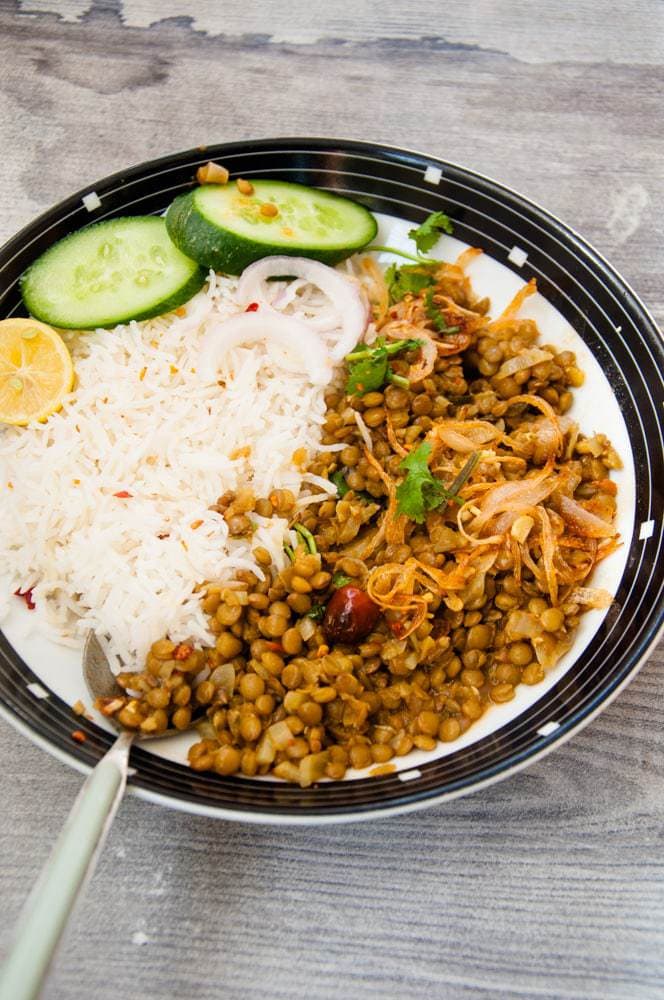 Masoor and rice served in a plate.