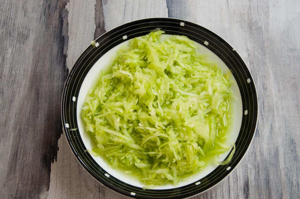 Grated cucumbers kept in a plate.