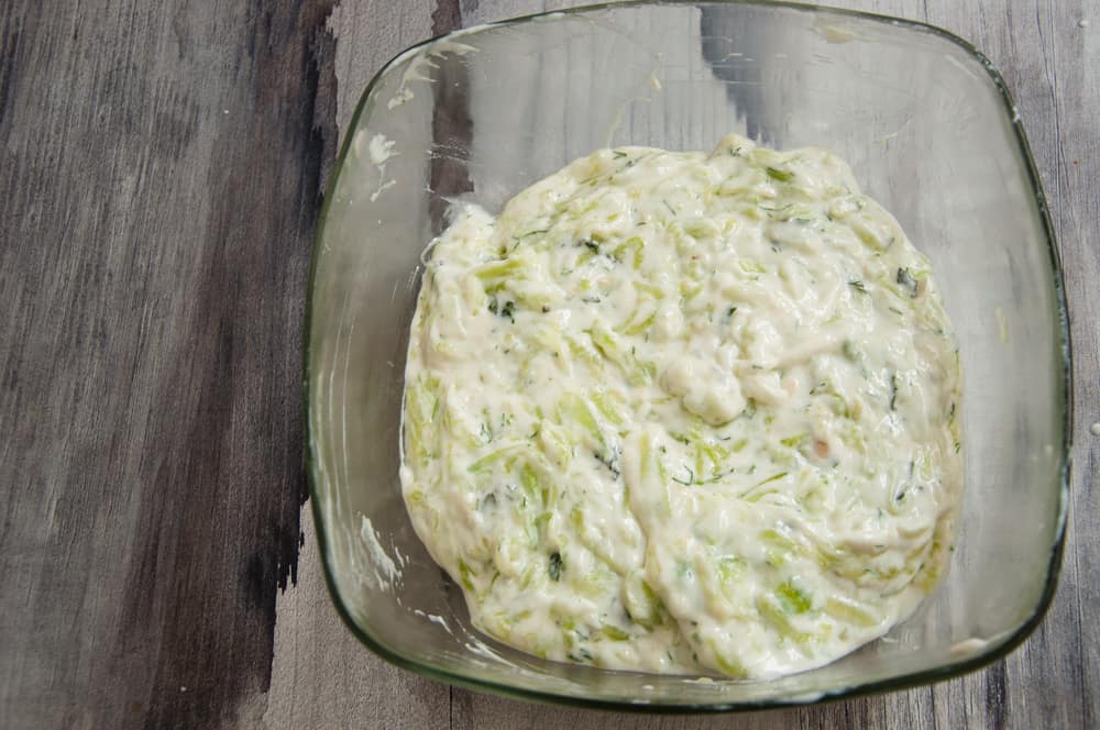 Mix the healthy tzatziki sauce.