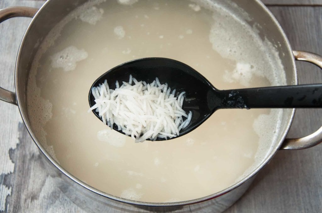 Rice boiled in a pot.