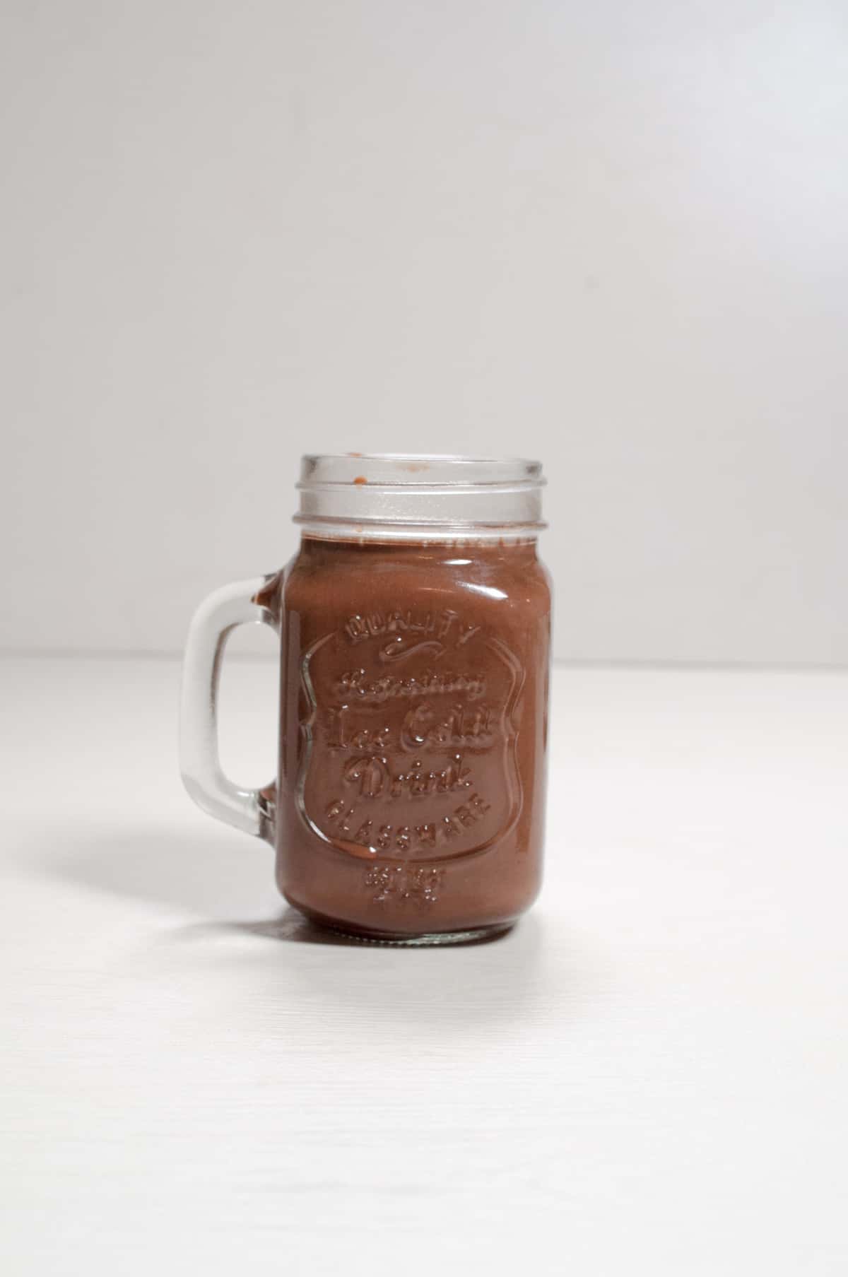 iced chocolate tea in a jar.