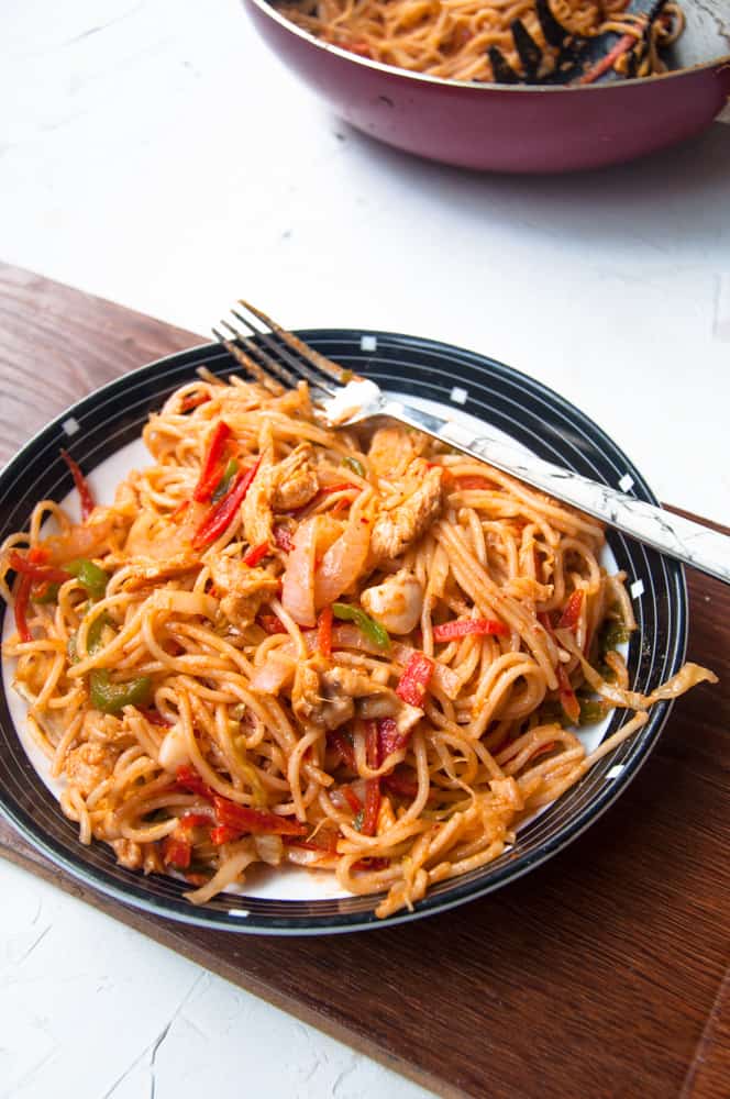 Pakistani Indian Spicy Desi Chow mein served in a plate.