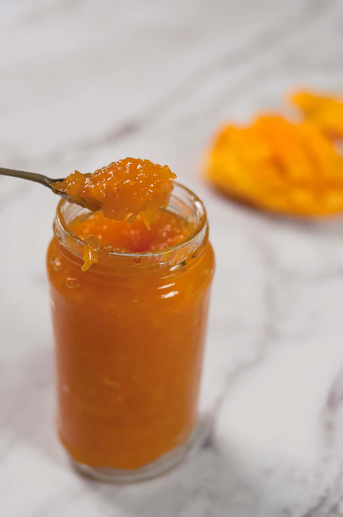 Mango jam in a jar.