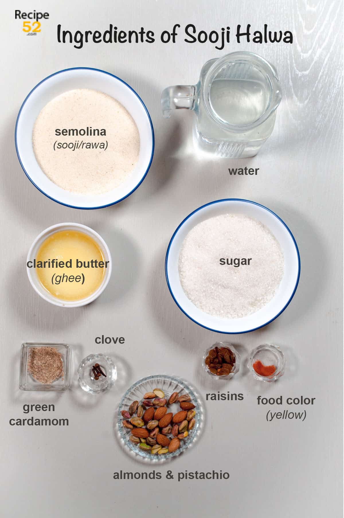 Ingredients of yellow Indian semolina pudding without milk and oil. Sooji is made with  ghee, sugar, farina and nuts. 