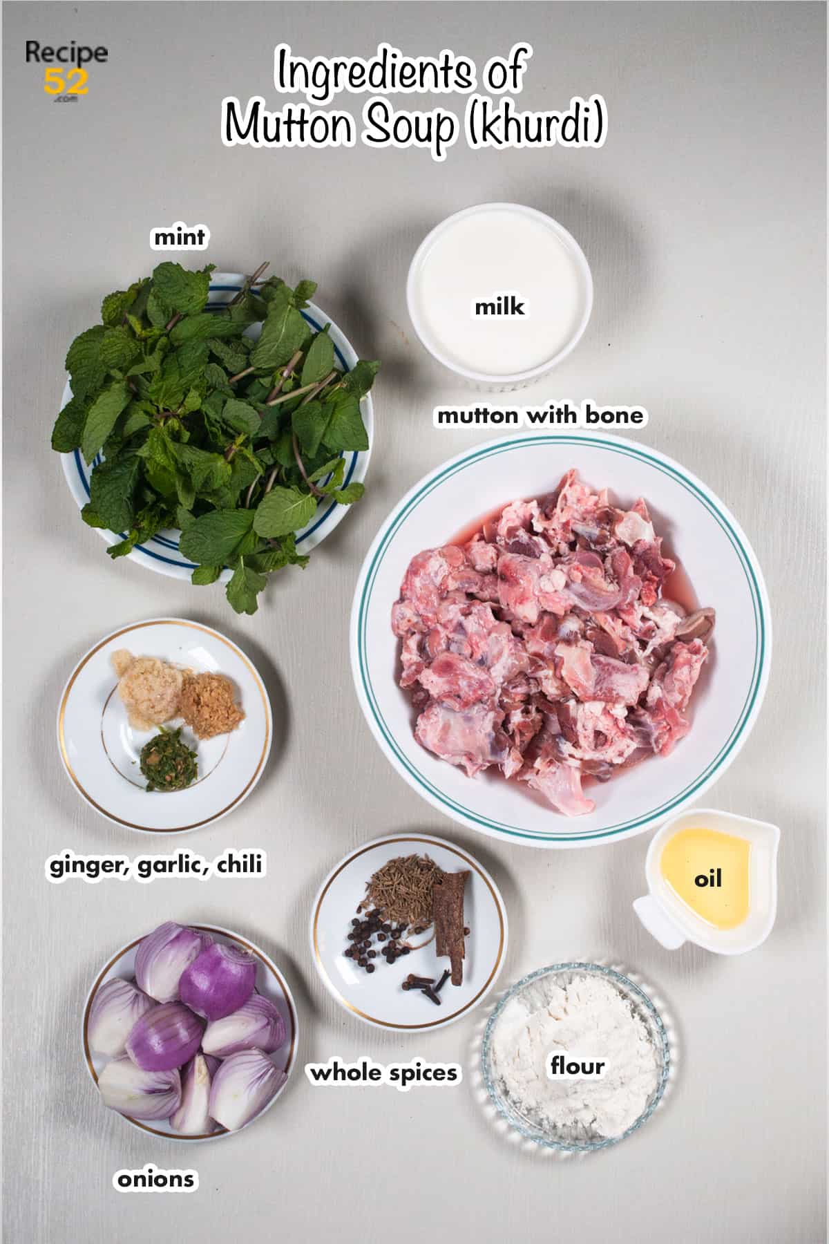 Ingredients of mutton soup placed on a white table.