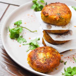 a close up shot of aloo tikki.