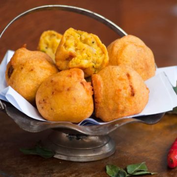 Delicious close up of bata vada on the wooden bachground.