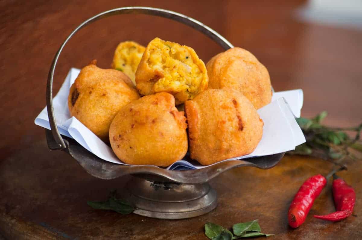 Delicious close up of bata vada on the wooden background.