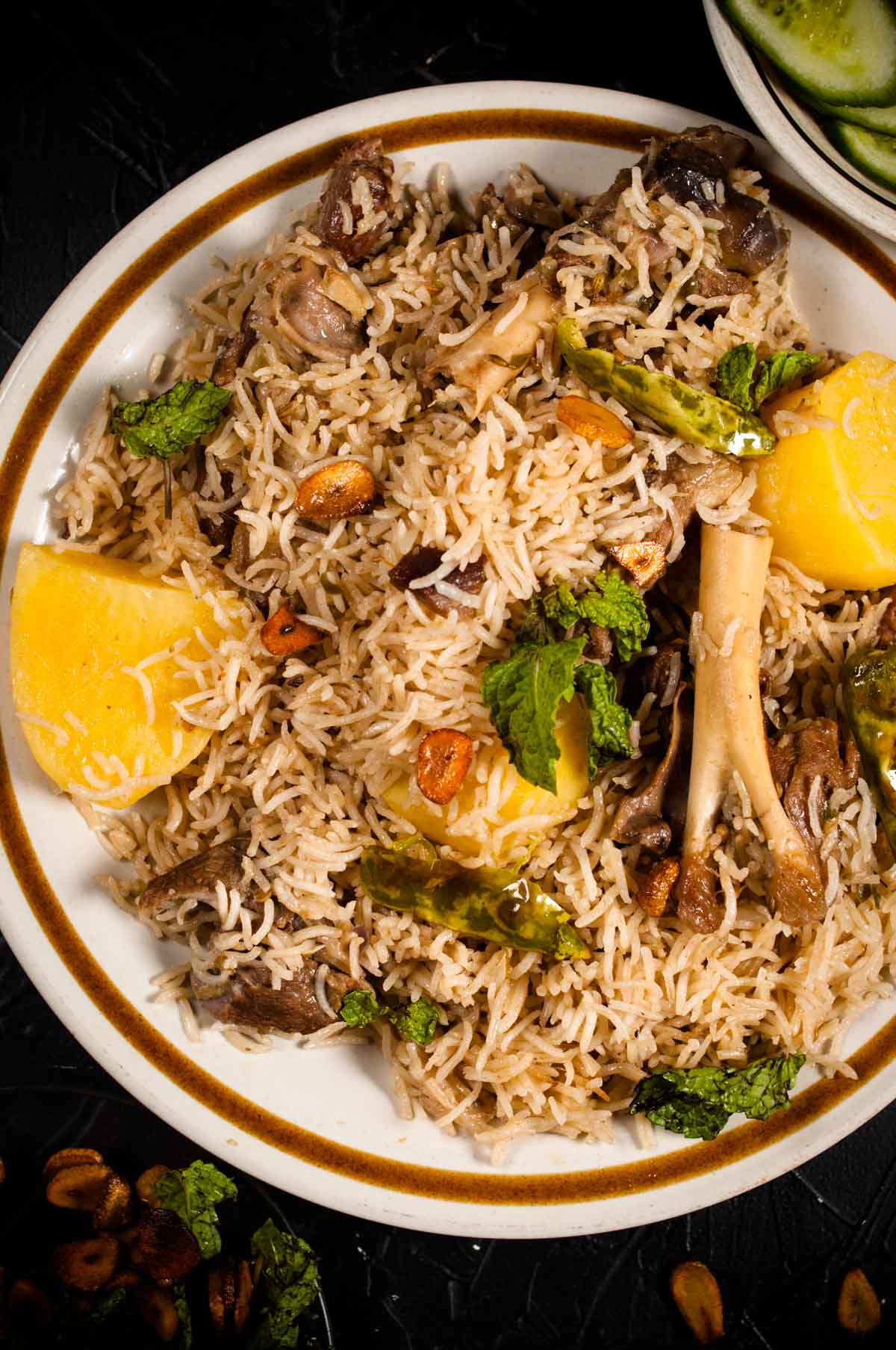 A close shot of pulao in the plate clearly showing the grains.