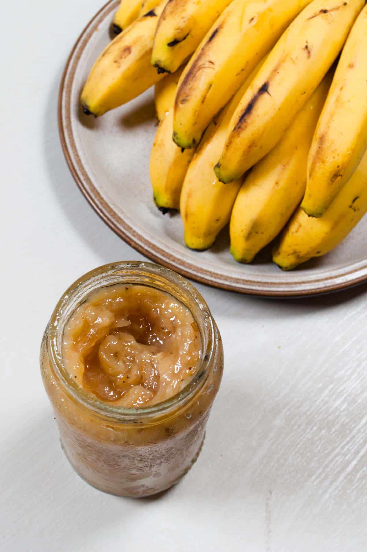 A close uo of jar of banana jam.