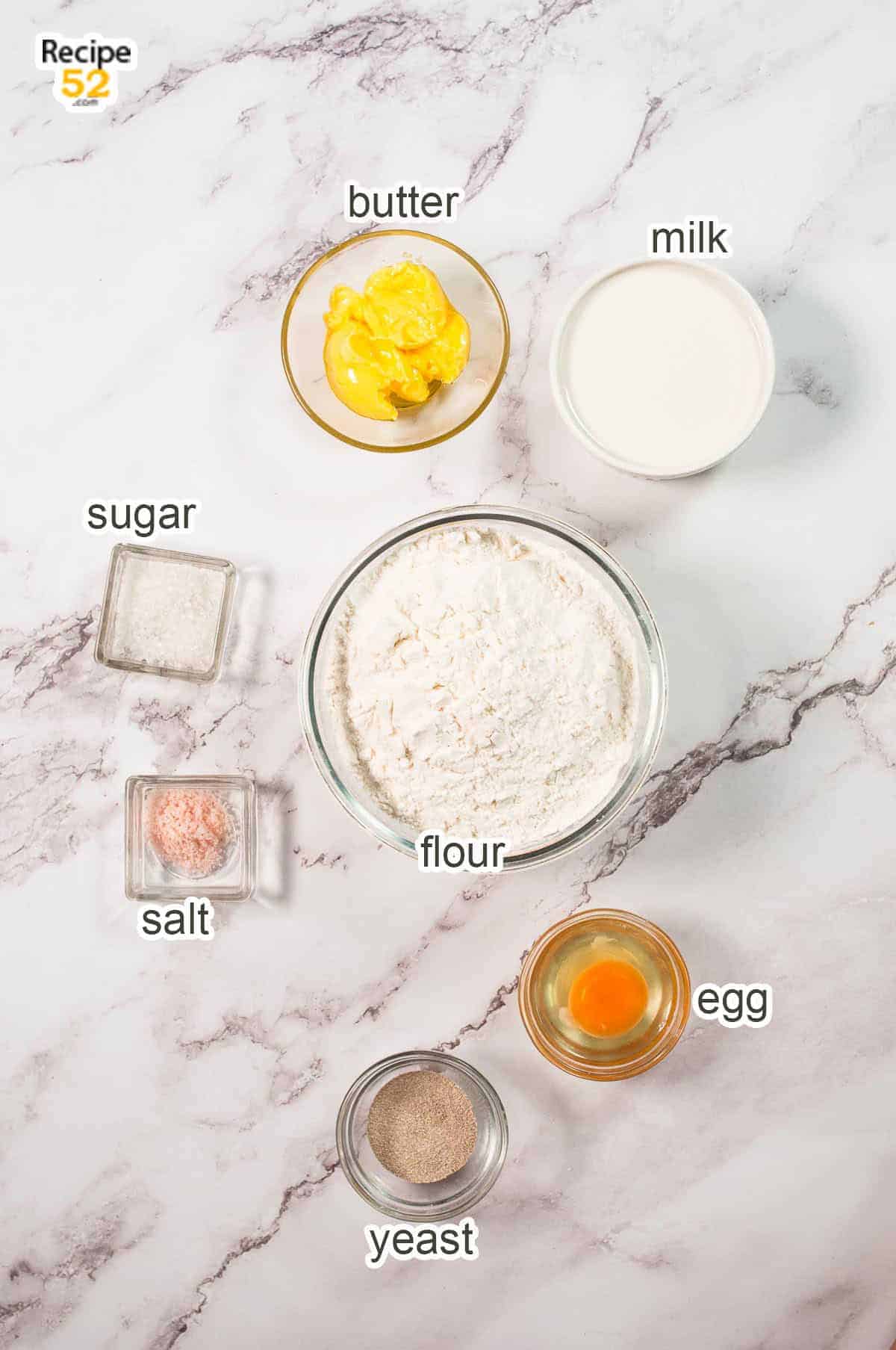 Ingredients of dough on the marble background.
