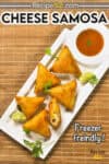 Image of samosas served in a platter with ketchup.